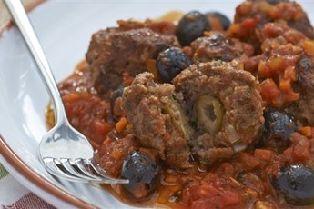 Olive-stuffed beef meatballs