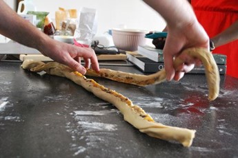 Andrew twisting the dough