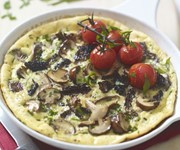Mushroom frittata with cherry tomatoes and basil recipe